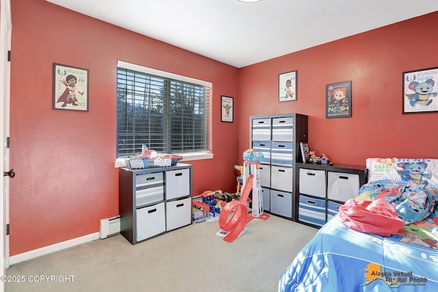 bedroom featuring baseboards, carpet floors, and baseboard heating