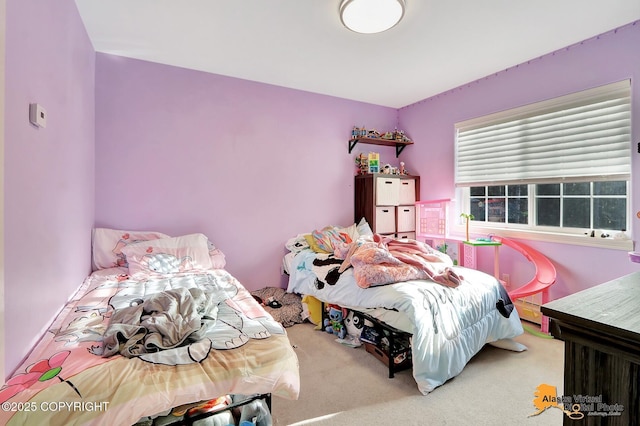 carpeted bedroom with baseboard heating