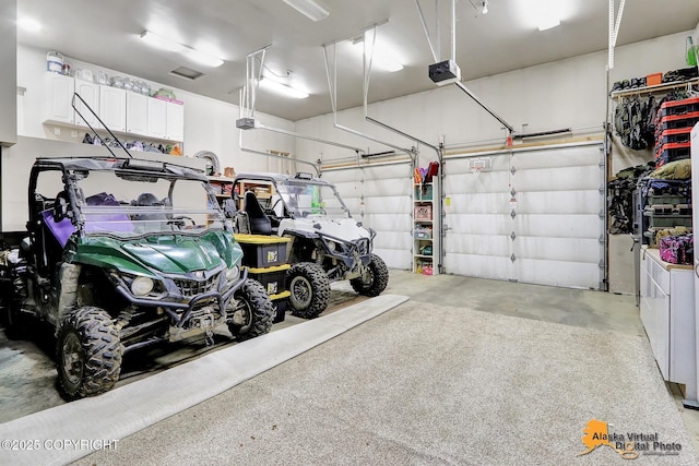 garage featuring a garage door opener