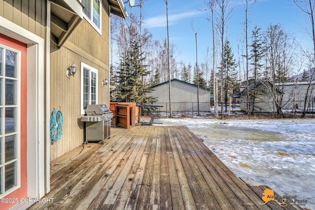 deck with grilling area and fence