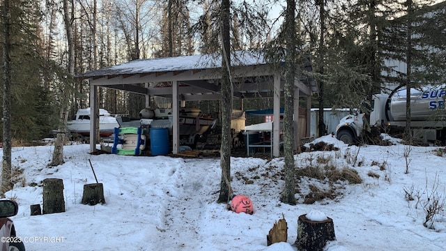 view of yard covered in snow