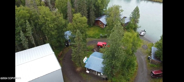 drone / aerial view with a water view