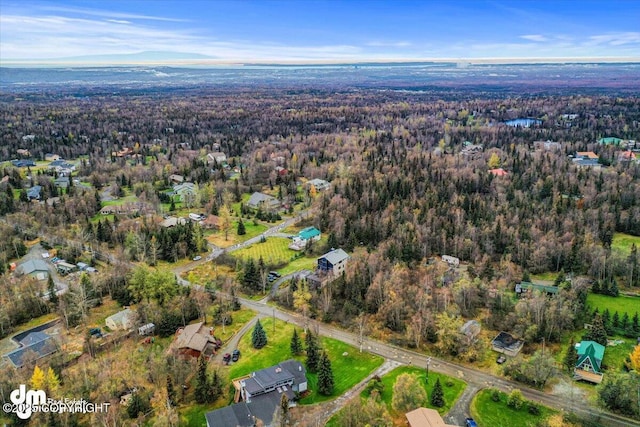 aerial view featuring a forest view