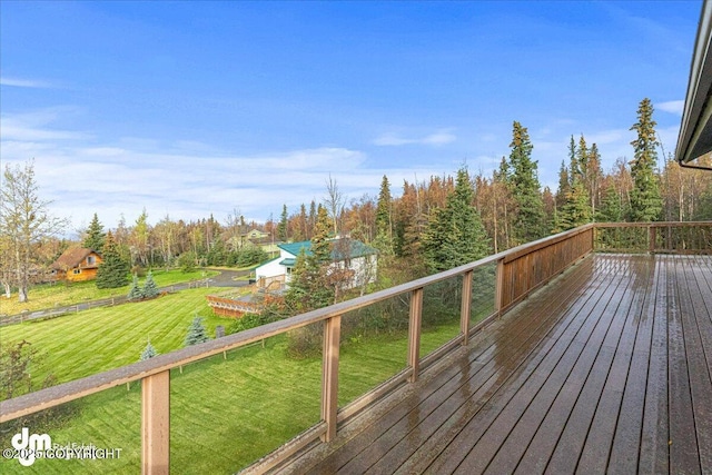 deck featuring a lawn