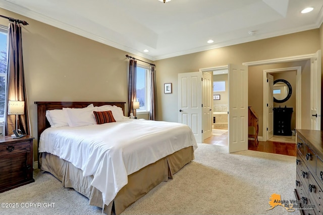 bedroom with recessed lighting, light carpet, a raised ceiling, and crown molding