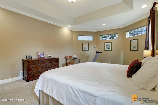 bedroom featuring recessed lighting, light colored carpet, baseboards, and a tray ceiling