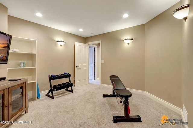 workout room with recessed lighting, baseboards, and carpet