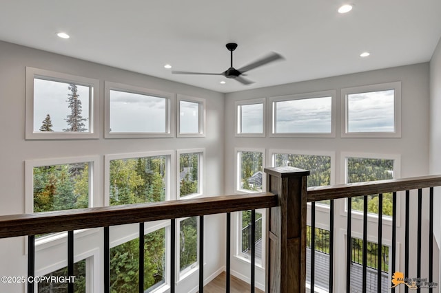 sunroom / solarium with ceiling fan