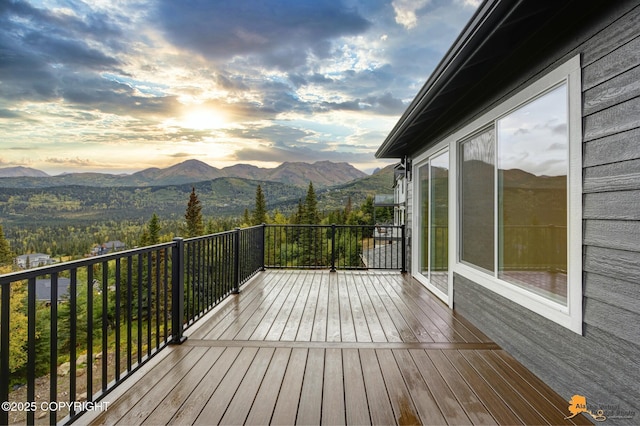 wooden terrace featuring a mountain view