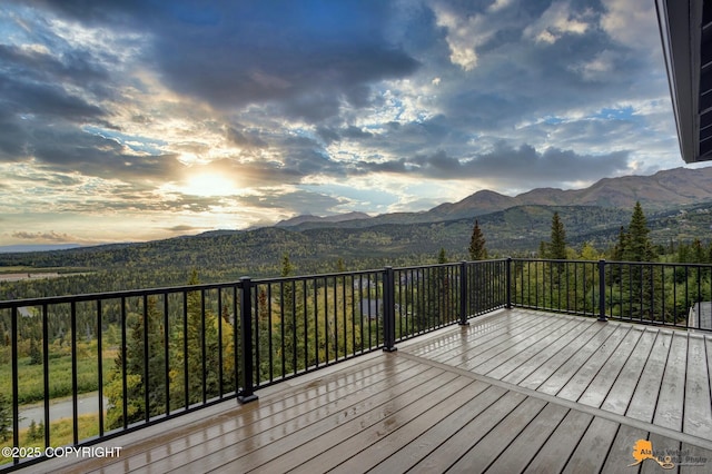 wooden terrace with a mountain view