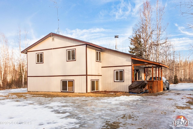 view of snow covered property