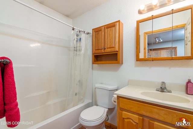 bathroom with toilet, vanity, and shower / bath combination with curtain