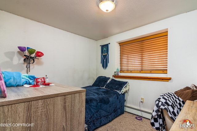 carpeted bedroom featuring baseboard heating