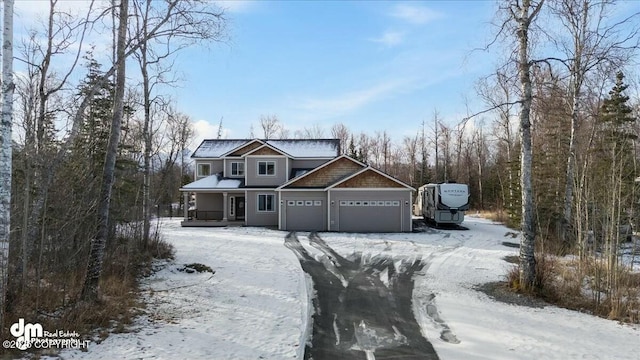 view of front facade with an attached garage and driveway