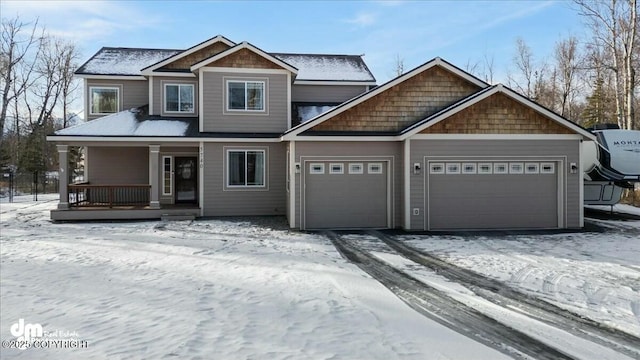 view of front of property featuring a porch and an attached garage