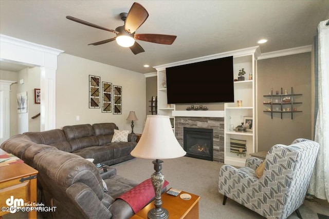 carpeted living room featuring recessed lighting, ceiling fan, a tiled fireplace, and ornamental molding