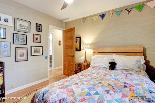 bedroom with baseboards and ceiling fan