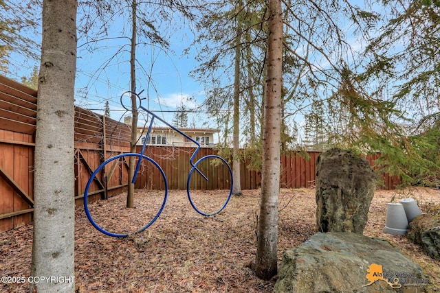 view of yard with fence