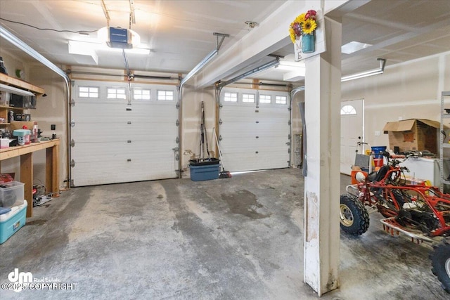 garage featuring a garage door opener