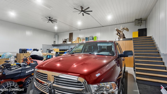 garage with ceiling fan and metal wall