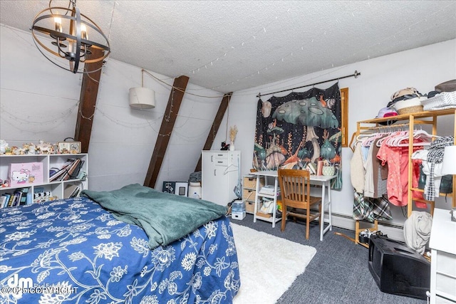 carpeted bedroom featuring a textured ceiling