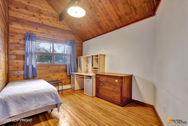 bedroom with baseboards, light wood finished floors, lofted ceiling, wood ceiling, and wood walls