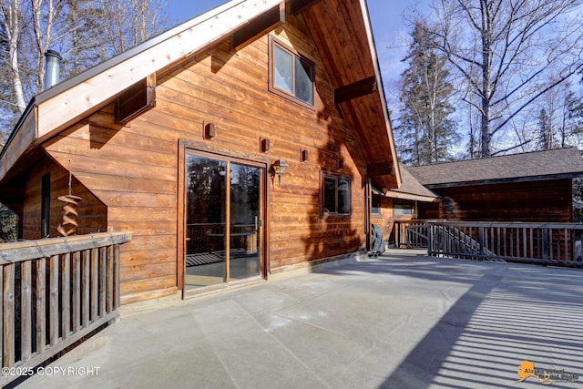 rear view of house with a patio