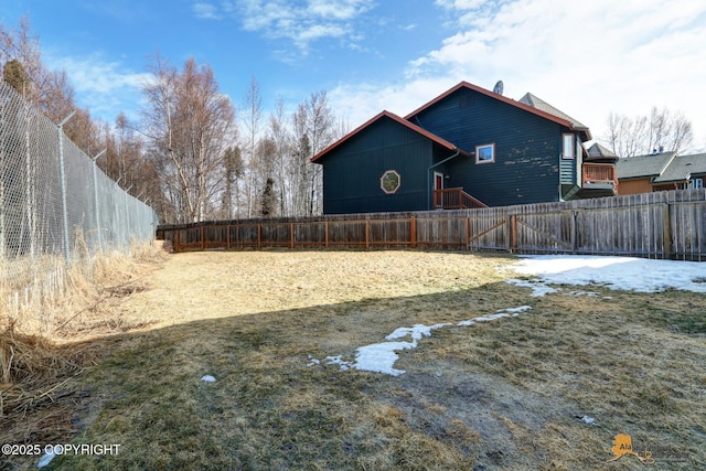 view of property exterior with a fenced backyard