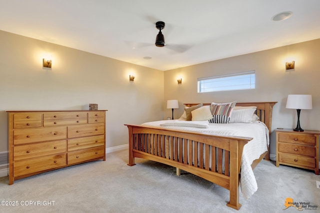 bedroom featuring light carpet, visible vents, baseboards, and a ceiling fan