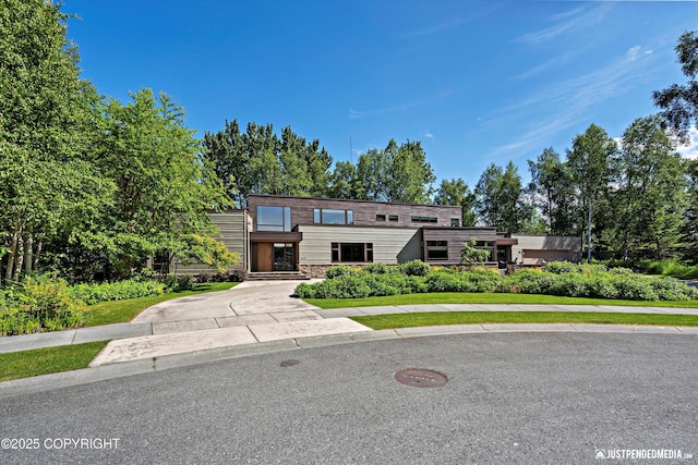 1665 Bob Atwood Cir, Anchorage, AK 99517 - view of front of property with stone siding