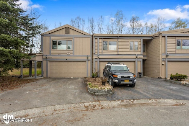 view of front facade with driveway and an attached garage