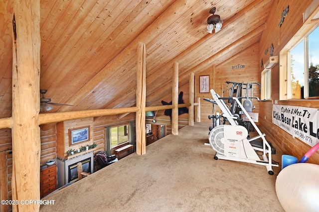 exercise area featuring carpet, log walls, ceiling fan, vaulted ceiling, and wooden ceiling