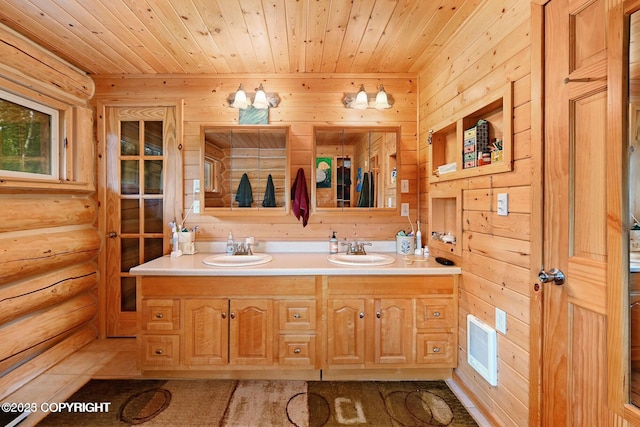 full bath with double vanity, wood ceiling, visible vents, and a sink