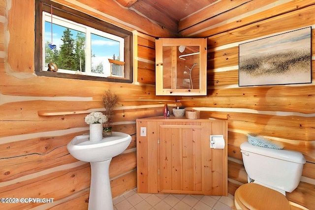 bathroom featuring toilet