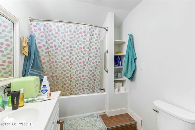 bathroom featuring baseboards, toilet, shower / tub combo with curtain, wood finished floors, and vanity