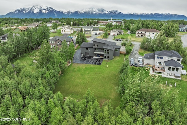 9475 E Spring Creek Cir, Wasilla, AK 99654 - aerial perspective of suburban area with a mountainous background