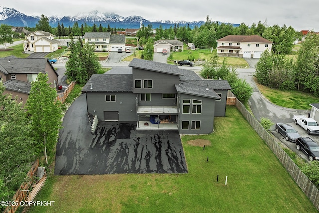 9475 E Spring Creek Cir, Wasilla, AK 99654 - aerial perspective of suburban area featuring a mountainous background