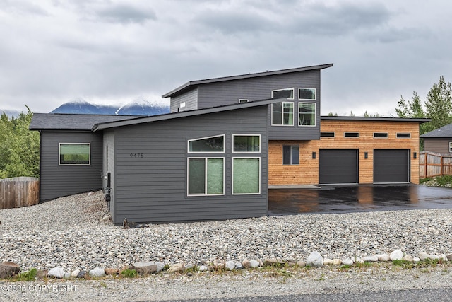 9475 E Spring Creek Cir, Wasilla, AK 99654 - view of front facade with a garage and driveway