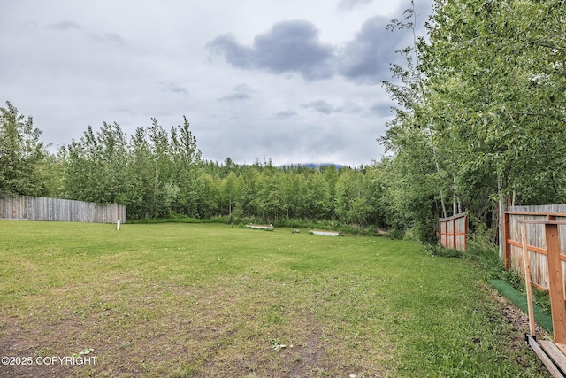 9475 E Spring Creek Cir, Wasilla, AK 99654 - view of yard featuring a forest view