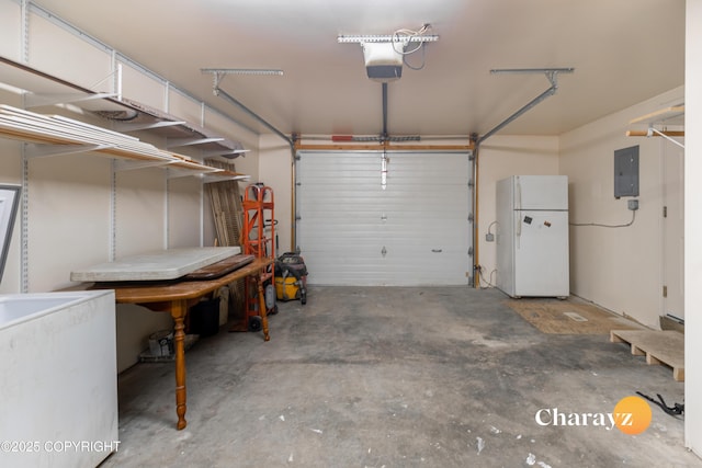 garage featuring electric panel, a garage door opener, and freestanding refrigerator