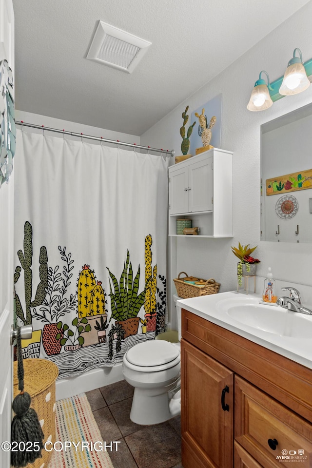 bathroom featuring vanity, tile patterned floors, toilet, and shower / bathtub combination with curtain