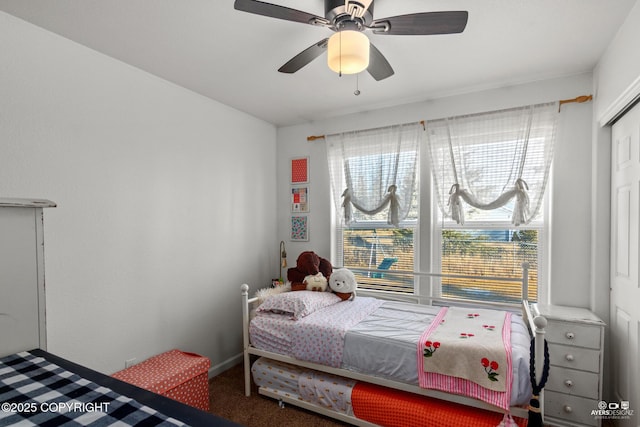 bedroom featuring carpet and ceiling fan