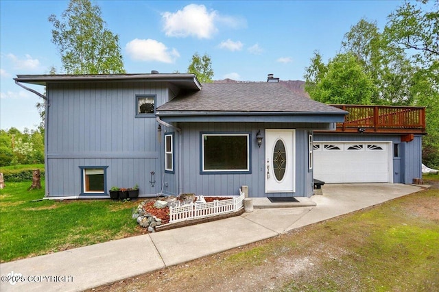 24508 Reese Rd, Chugiak, AK 99567 - view of front of property featuring driveway, a front lawn, roof with shingles, an attached garage, and a chimney