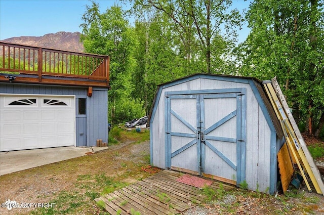 24508 Reese Rd, Chugiak, AK 99567 - view of shed featuring a garage and a mountain view