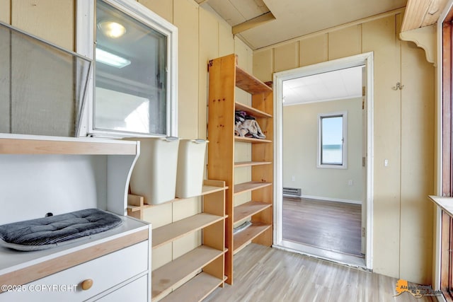 kitchen with open shelves, visible vents, light countertops, and light wood finished floors