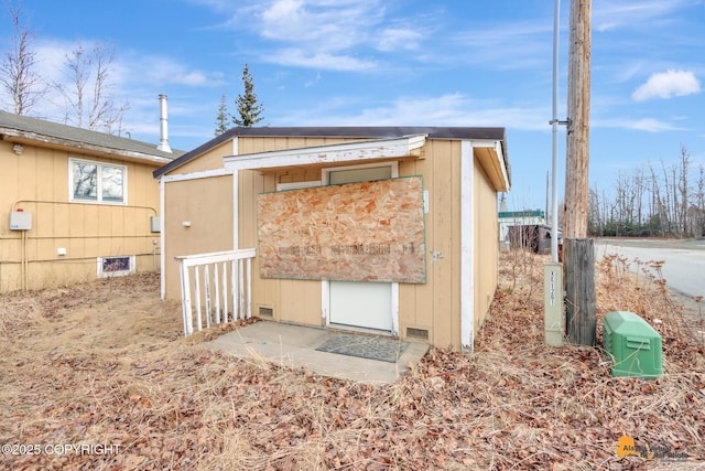 exterior space with an outbuilding