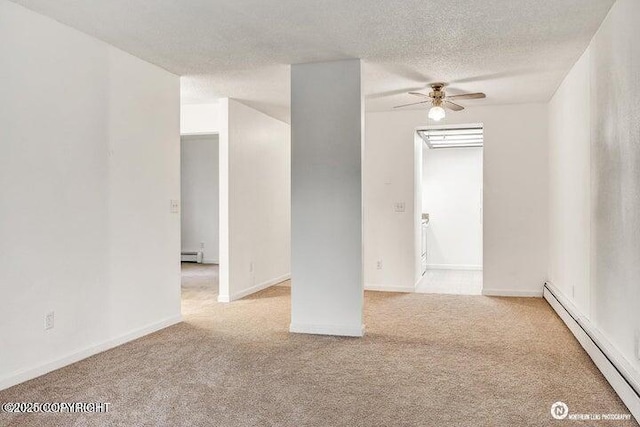 empty room with light carpet, a ceiling fan, a baseboard heating unit, a textured ceiling, and baseboard heating