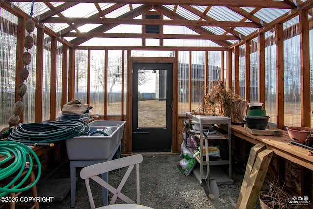 sunroom with lofted ceiling