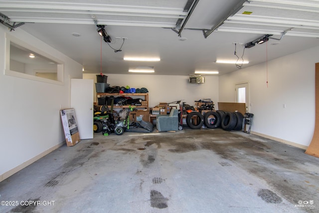 garage featuring baseboards