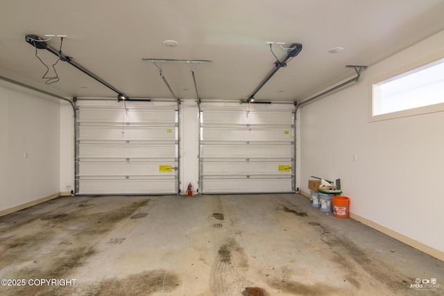 garage featuring baseboards